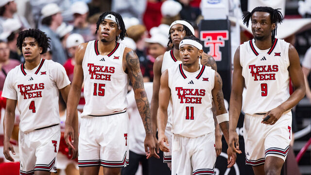 LUBBOCK, TEXAS - FEBRUARY 11: JT Toppin #15 of the Texas Tech Red Raiders and teammates walk across the court during the second half of the game against the Colorado Buffaloes at United Supermarkets Arena on February 11, 2026 in Lubbock, Texas.