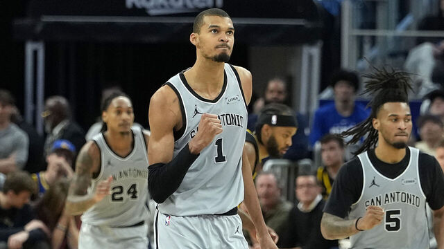 SAN FRANCISCO, CALIFORNIA - FEBRUARY 11: Victor Wembanyama #1 of the San Antonio Spurs reacts after making a three-point shot against the Golden State Warriors in the second half at Chase Center on February 11, 2026 in San Francisco, California.
