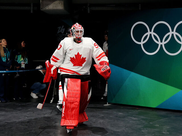 MILAN, ITALY - FEBRUARY 12: Jordan Binnington #50 of Team Canada walks out to the ice before the Men's Preliminary Group A match between Czechia and Canada on day six of the Milano Cortina 2026 Winter Olympic games at Milano Santagiulia Ice Hockey Arena on February 12, 2026 in Milan, Italy.