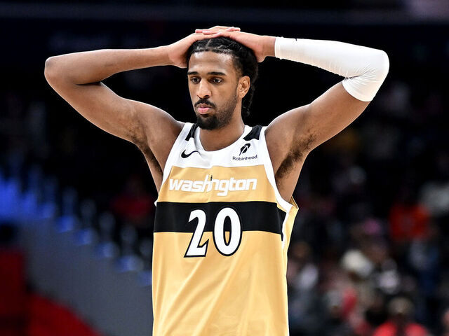 WASHINGTON, DC - FEBRUARY 08: Alex Sarr #20 of the Washington Wizards reacts to a call in the game against the Miami Heat at Capital One Arena on February 08, 2026 in Washington, DC.