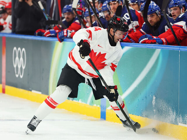 MILAN, ITALY - FEBRUARY 12: Josh Morrissey #44 of Team Canada skates with the puck in the first period during the Men's Preliminary Group A match between Czechia and Canada on day six of the Milano Cortina 2026 Winter Olympic games at Milano Rho Ice Hockey Arena on February 12, 2026 in Milan, Italy.