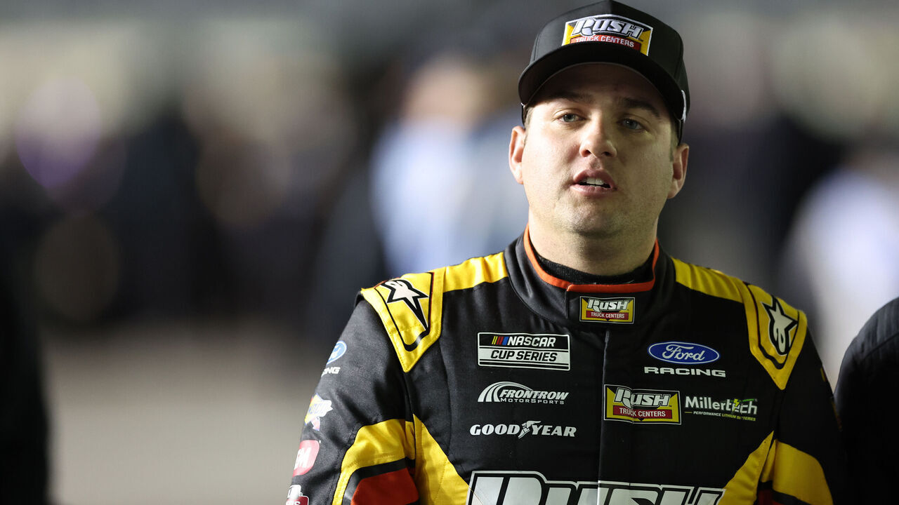 DAYTONA BEACH, FL - FEBRUARY 11: Noah Gragson (#4 Front Row Motorsports Rush Truck Centers Ford) walks down pit road during qualifying for the NASCAR Cup Series Daytona 500 on February 11, 2026 at Daytona International Speedway in Daytona Beach, FL.