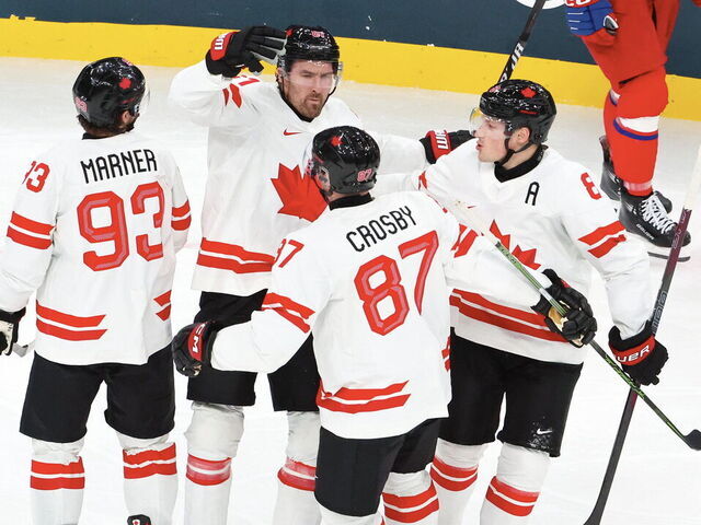 MILAN, ITALY - FEBRUARY 12: Mark Stone #61 of Team Canada celebrates his first goal with teammates during the Men's Ice Hockey - Group A match between Team Czech Republic and Team Canada on day six of the Milano Cortina 2026 Winter Olympic games at Milano Santagiulia Ice Hockey Arena on February 12, 2026 in Milan, Italy.