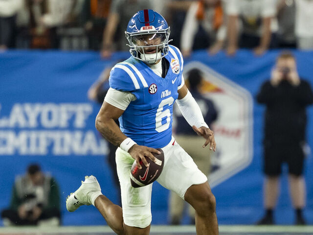 GLENDALE, ARIZONA - JANUARY 8: Trinidad Chambliss #6 of the Mississippi Rebels moves with the ball in the fourth quarter of the 2025 College Football Playoff Semifinal at State Farm Stadium on January 8, 2026 in Glendale, Arizona.