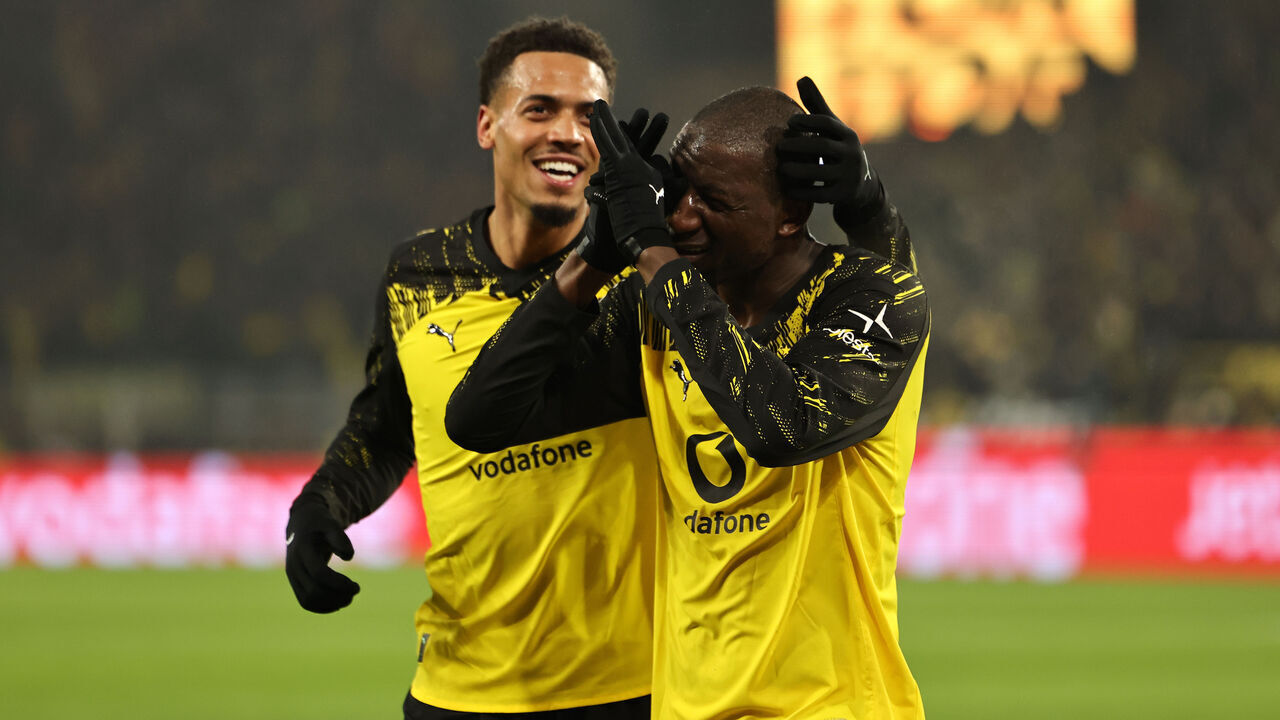 DORTMUND, GERMANY - FEBRUARY 13: Serhou Guirassy of Borussia Dortmund celebrates scoring his team's third goal with teammate Felix Nmecha during the Bundesliga match between Borussia Dortmund and 1. FSV Mainz 05 at Signal Iduna Park on February 13, 2026 in Dortmund, Germany.
