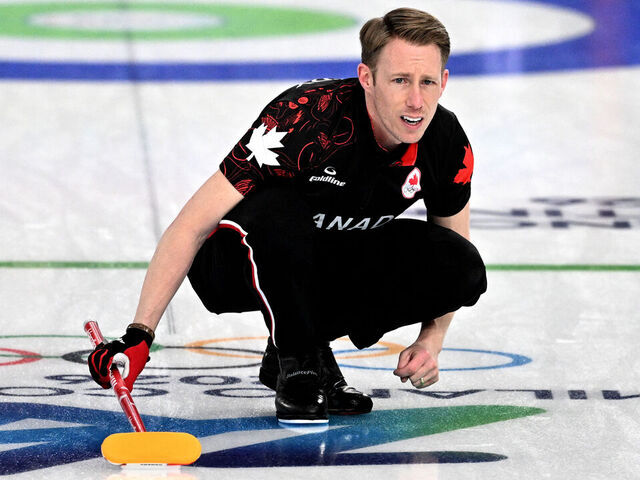 Marc Kennedy of Team Canada competes in the curling men's round robin between Canada and USA during the Milano Cortina 2026 Winter Olympic Games at the Cortina Curling Olympic Stadium in Cortina d'Ampezzo on February 13, 2026.