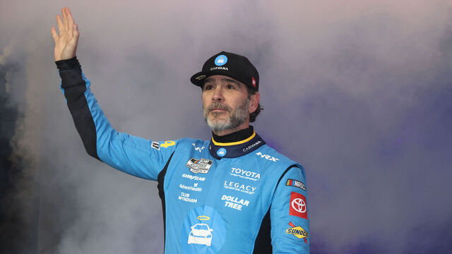 DAYTONA BEACH, FL - FEBRUARY 12: Jimmie Johnson (#84 Legacy Motor Club Carvana Toyota) waves to the crowd prior to the running of the NASCAR Cup Series Daytona 500 Duel 1 on February 12, 2026 at Daytona International Speedway in Daytona Beach, FL.