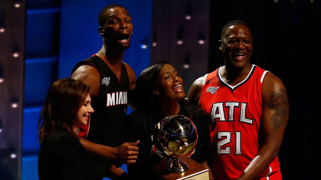 NEW YORK, NY - FEBRUARY 14: Chris Bosh #1 of the Miami Heat and the Eastern Conference celebrates with NBA Legend Dominique Wilkins and Swin Cash #32 of the New York Liberty after winning the Degree Shooting Stars Competition as part of the 2015 NBA Allstar Weekend at Barclays Center on February 14, 2015 in the Brooklyn borough of New York City.