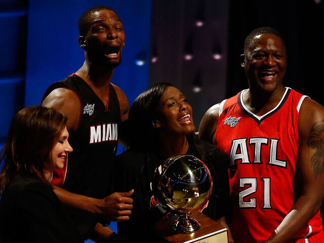 NEW YORK, NY - FEBRUARY 14: Chris Bosh #1 of the Miami Heat and the Eastern Conference celebrates with NBA Legend Dominique Wilkins and Swin Cash #32 of the New York Liberty after winning the Degree Shooting Stars Competition as part of the 2015 NBA Allstar Weekend at Barclays Center on February 14, 2015 in the Brooklyn borough of New York City.