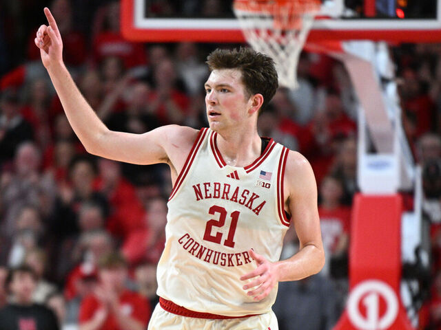 LINCOLN, NEBRASKA - FEBRUARY 10: Pryce Sandfort #21 of the Nebraska Cornhuskers signals after scoring against the Purdue Boilermakers in overtime at Pinnacle Bank Arena on February 10, 2026 in Lincoln, Nebraska.