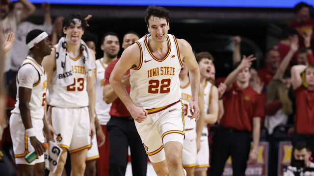 AMES, IOWA - FEBRUARY 14: Milan Momcilovic #22 of the Iowa State Cyclones reacts after scoring a three-point basket in the first half of play against the Kansas Jayhawks at Hilton Coliseum on February 14, 2026 in Ames, Iowa. Iowa State won 74-56.