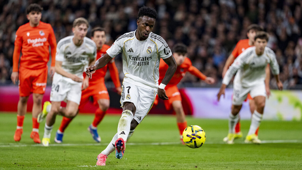 Vinicius Junior of Real Madrid scores a penalty during the LaLiga EA Sports football match between Real Madrid CF and Real Sociedad at Estadio Bernabeu in Madrid, Spain, on February 14, 2026.