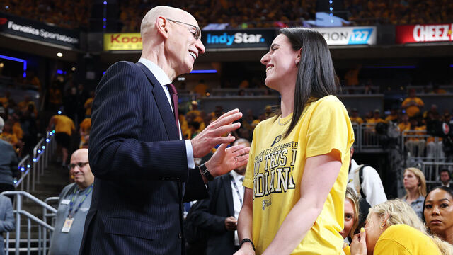 INDIANAPOLIS, INDIANA - JUNE 11: NBA Commissioner Adam Silver and Caitlin Clark of the Indiana Fever speak during Game Three of the 2025 NBA Finals between the Indiana Pacers and the Oklahoma City Thunder at Gainbridge Fieldhouse on June 11, 2025 in Indianapolis, Indiana.
