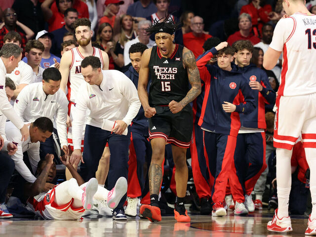 TUCSON, ARIZONA - FEBRUARY 14: JT Toppin #15 of the Texas Tech Red Raiders celebrates as time expires in overtime to defeat the Arizona Wildcats 78-75 at McKale Center at ALKEME Arena on February 14, 2026 in Tucson, Arizona.