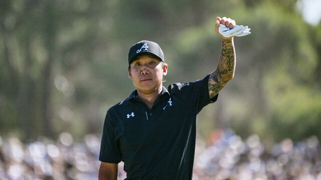 4Aces GC player Anthony Kim from the US celebrates winning the LIV Golf Adelaide tournament at The Grange Golf Club in Adelaide on February 15, 2026. / -- IMAGE RESTRICTED TO EDITORIAL USE - STRICTLY NO COMMERCIAL USE --