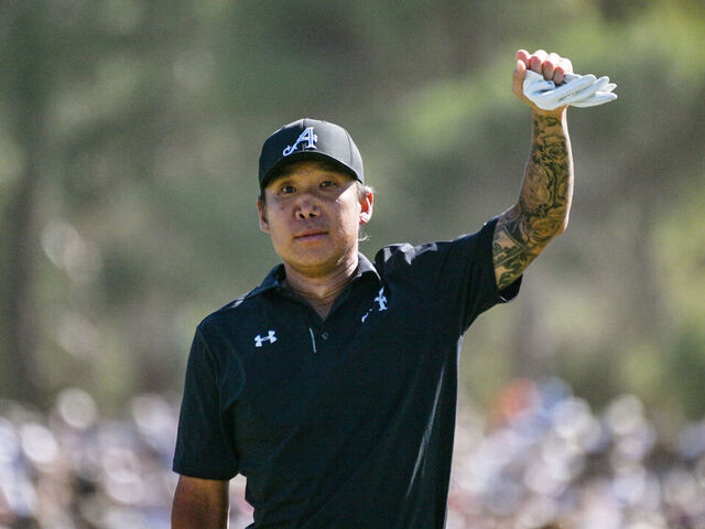 4Aces GC player Anthony Kim from the US celebrates winning the LIV Golf Adelaide tournament at The Grange Golf Club in Adelaide on February 15, 2026. / -- IMAGE RESTRICTED TO EDITORIAL USE - STRICTLY NO COMMERCIAL USE --