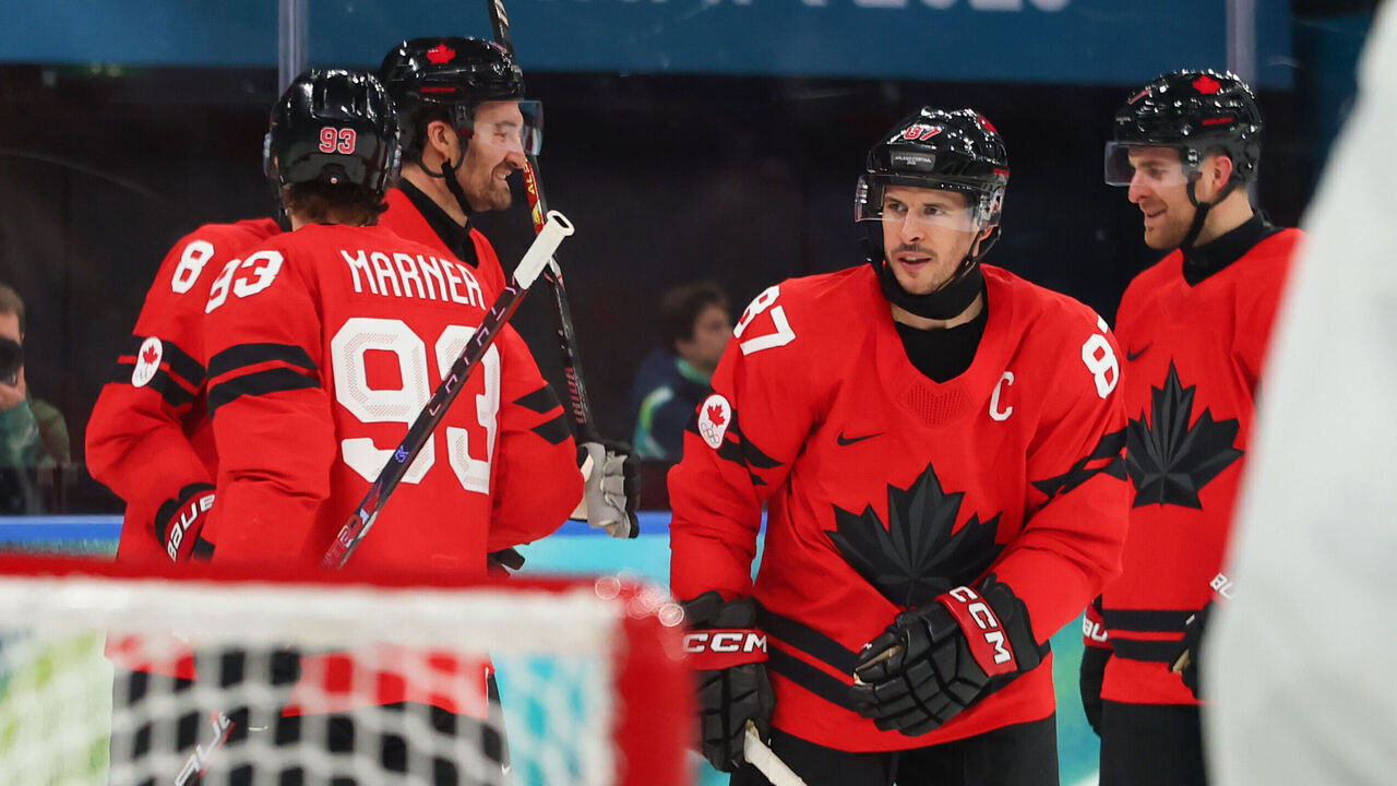 MILAN, ITALY - FEBRUARY 15: Sidney Crosby #87 of Team Canada celebrates with teammates after scoring a goal in the second period during the Men's Preliminary Group A match between Canada and France on day nine of the Milano Cortina 2026 Winter Olympic games at Milano Santagiulia Ice Hockey Arena on February 15, 2026 in Milan, Italy.