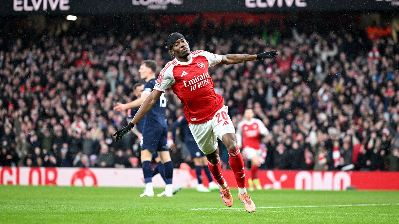 LONDON, ENGLAND - FEBRUARY 15: Noni Madueke celebrates scoring the 1st Arsenal goal during the Emirates FA Cup Fourth Round match between Arsenal and Wigan Athletic on February 15, 2026 in London, England.