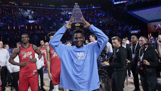 INGLEWOOD, CALIFORNIA - FEBRUARY 15: Anthony Edwards #5 of the Minnesota Timberwolves and Team USA Stars holds up the Most Valuable Player trophy after the 75th NBA All-Star Game at Intuit Dome on February 15, 2026 in Inglewood, California.