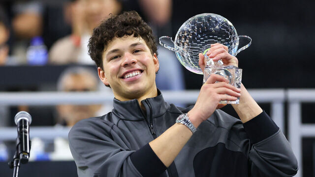 FRISCO, TEXAS - FEBRUARY 15: Ben Shelton of the United States holds the winner's trophy after defeating Taylor Fritz of the United States to win the Men's Singles competition at the 2026 Dallas Open at The Ford Center at The Star on February 15, 2026 in Frisco, Texas.