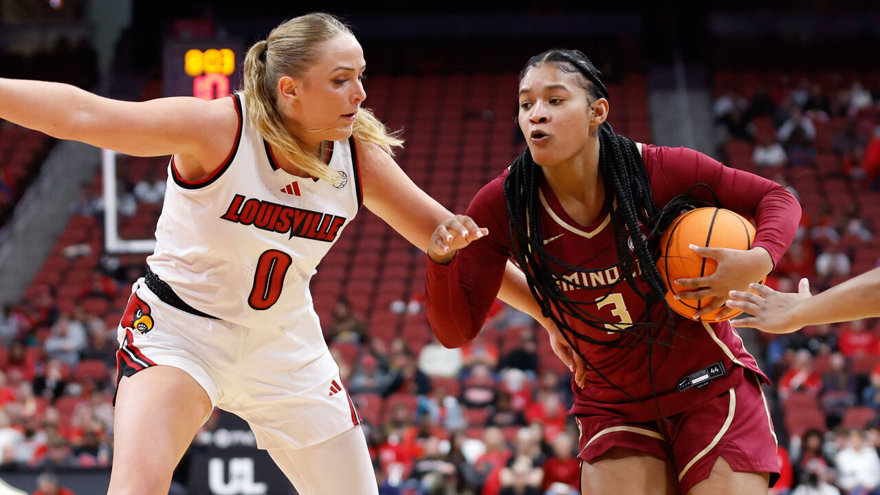 LOUISVILLE, KENTUCKY - FEBRUARY 15: Jasmine Shavers #3 of the Florida State Seminoles drives towards the basket against Laura Ziegler #0 of the Louisville Cardinals during the third quarter at KFC YUM! Center on February 15, 2026 in Louisville, Kentucky.
