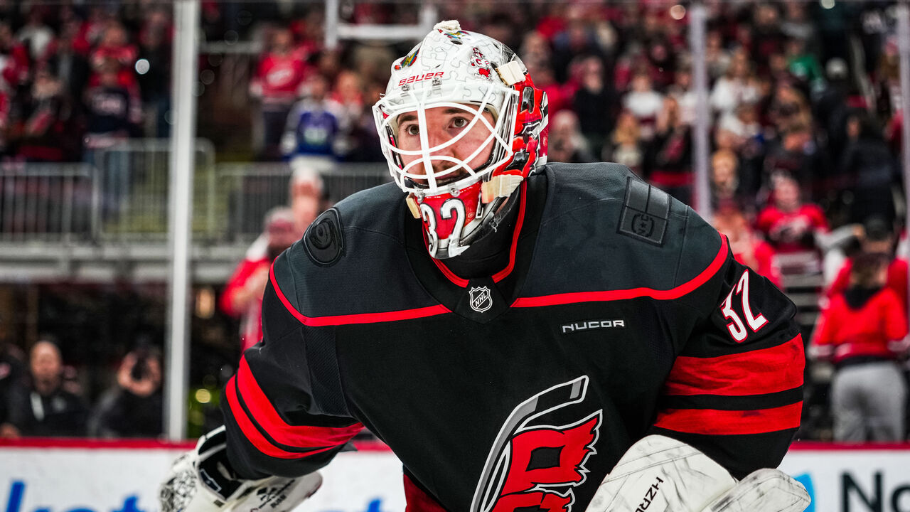 RALEIGH, NORTH CAROLINA - FEBRUARY 03: Brandon Bussi #32 of the Carolina Hurricanes reacts after a 4-3 victory against the Ottawa Senators at Lenovo Center on February 03, 2026 in Raleigh, North Carolina.