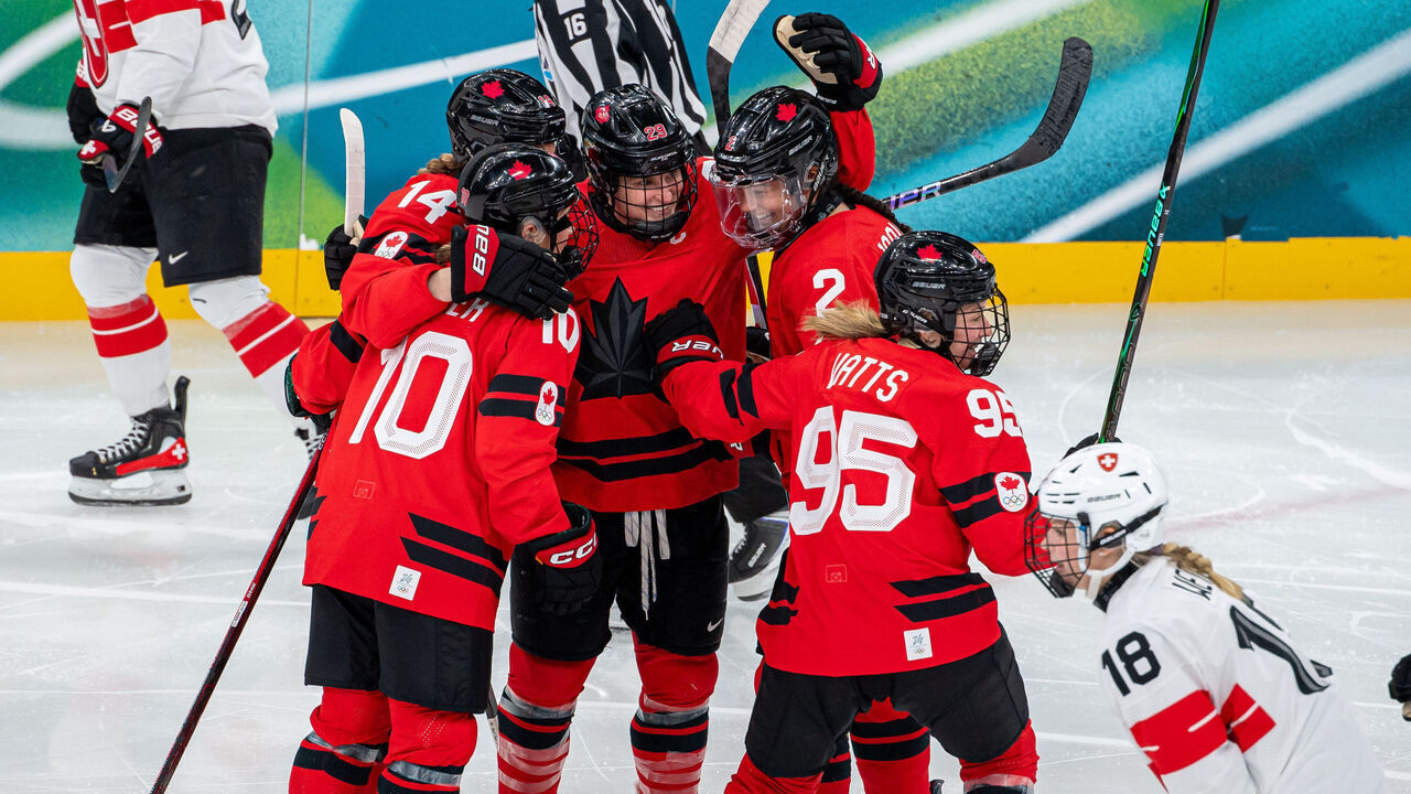 MILAN, ITALY - FEBRUARY 16: Marie-Philip Poulin #29 of Canada celebrates her goal with teammates during the Women's Semi-final match between Canada and Switzerland on day ten of the Milano Cortina 2026 Winter Olympic games at Milano Santagiulia Ice Hockey Arena on February 16, 2026 in Milan, Italy.