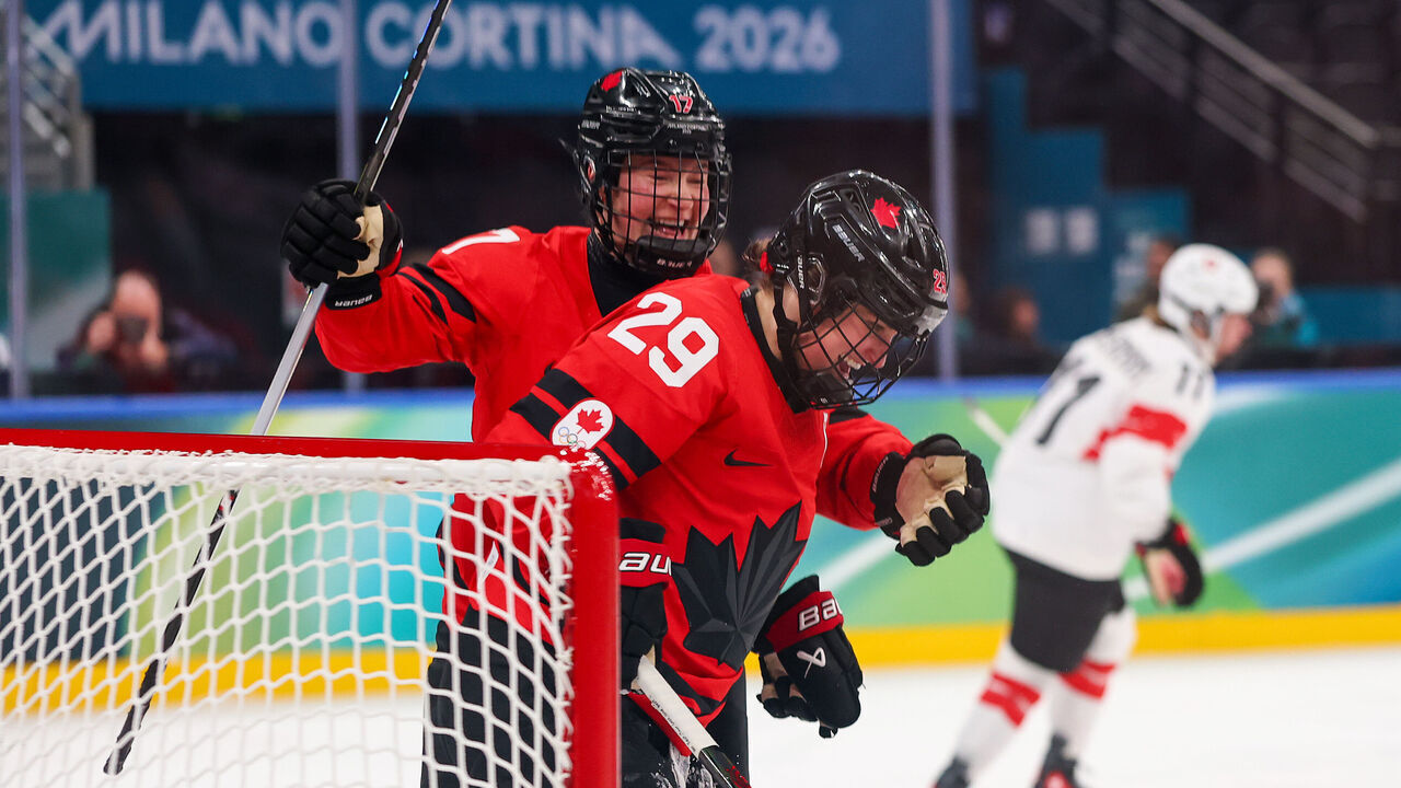 MILAN, ITALY - FEBRUARY 16: Marie-Philip Poulin #29 of Team Canada celebrates with teammate Ella Shelton #17 after scoring a goal in the second period during the Women's Playoffs Semifinal match between Canada and Switzerland on Day 10 of the Milano Cortina 2026 Winter Olympic games at Milano Santagiulia Ice Hockey Arena on February 16, 2026 in Milan, Italy.