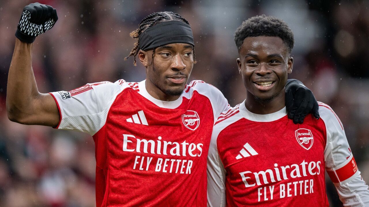 LONDON, ENGLAND - FEBRUARY 15: Noni Madueke of Arsenal celebrate with Bukayo Saka after scoring goal during the Emirates FA Cup Fourth Round match between Arsenal and Wigan Athletic on February 15, 2026 in London, England.