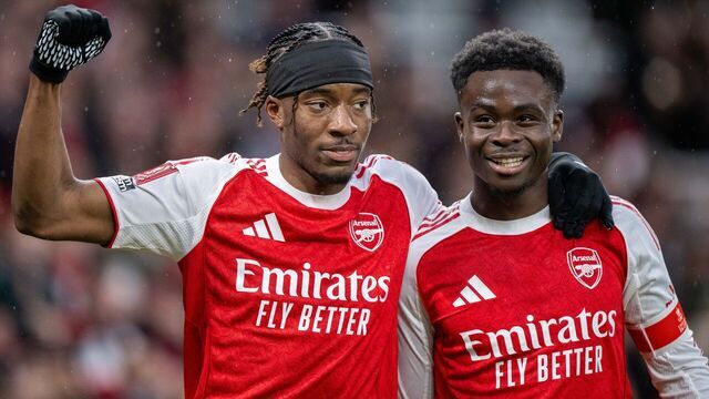 LONDON, ENGLAND - FEBRUARY 15: Noni Madueke of Arsenal celebrate with Bukayo Saka after scoring goal during the Emirates FA Cup Fourth Round match between Arsenal and Wigan Athletic on February 15, 2026 in London, England.