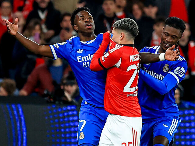 LISBON, PORTUGAL - FEBRUARY 17: Vinícius Júnior of Real Madrid CF and Gianluca Prestianni of SL Benfica argue during the UEFA Champions League 2025/26 League Knockout Play-off First Leg match between SL Benfica and Real Madrid C.F. at Estadio do SL Benfica on February 17, 2026 in Lisbon, Portugal.