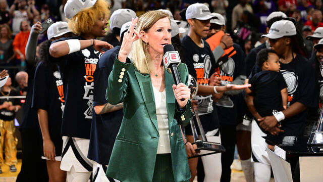 PHOENIX, AZ - OCTOBER 10: WNBA Commissioner Cathy Engelbert presents trophy to the Las Vegas Aces after the game against the Phoenix Mercury during Game Four of the WNBA Finals on October 10, 2025 at PHX Arena in Phoenix, Arizona. Mandatory Copyright Notice: Copyright 2025 NBAE