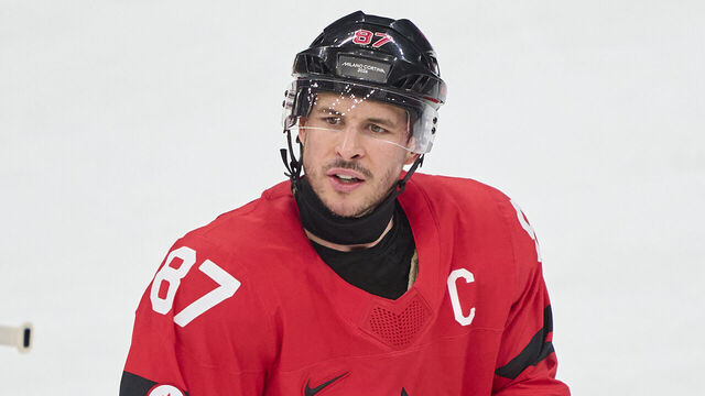 MILAN, ITALY - FEBRUARY 15: Sidney Crosby of Canada reacts during the Men's Preliminary Round Group A match between Canada and France on day nine of the Milano Cortina 2026 Winter Olympic games at Milano Santagiulia Ice Hockey Arena on February 15, 2026 in Milan, Italy.