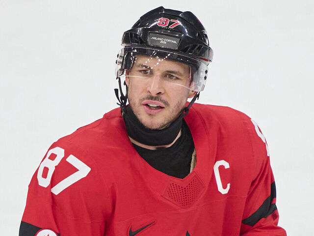 MILAN, ITALY - FEBRUARY 15: Sidney Crosby of Canada reacts during the Men's Preliminary Round Group A match between Canada and France on day nine of the Milano Cortina 2026 Winter Olympic games at Milano Santagiulia Ice Hockey Arena on February 15, 2026 in Milan, Italy.