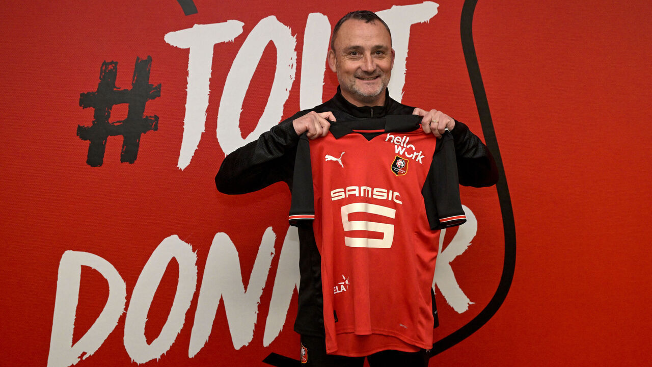 Stade Rennais' newly recruited French head coach Franck Haise holds a club's jersey during a press conference in Roazhon Park in Rennes, western France on February 18, 2026.