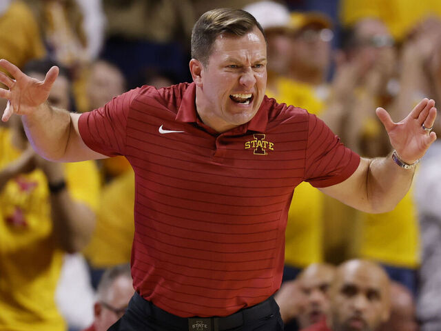 AMES, IA - FEBRUARY 16: Head coach T.J. Otzelberger of the Iowa State Cyclones coaches from the bench in the second half of play at Hilton Coliseum on February 16, 2026 in Ames, Iowa. The Iowa State Cyclones won 70-67 over the Houston Cougars.