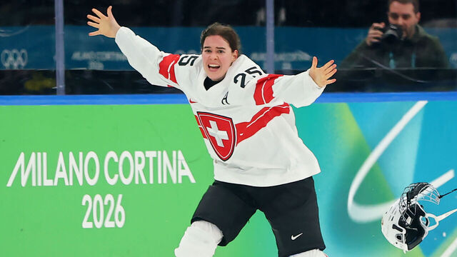 MILAN, ITALY - FEBRUARY 19: Alina Muller #25 of Team Switzerland celebrates after scoring the game winning goal to win the bronze medal during the Women's Bronze Medal match between Switzerland and Sweden on day 13 of the Milano Cortina 2026 Winter Olympic games at Milano Santagiulia Ice Hockey Arena on February 19, 2026 in Milan, Italy.