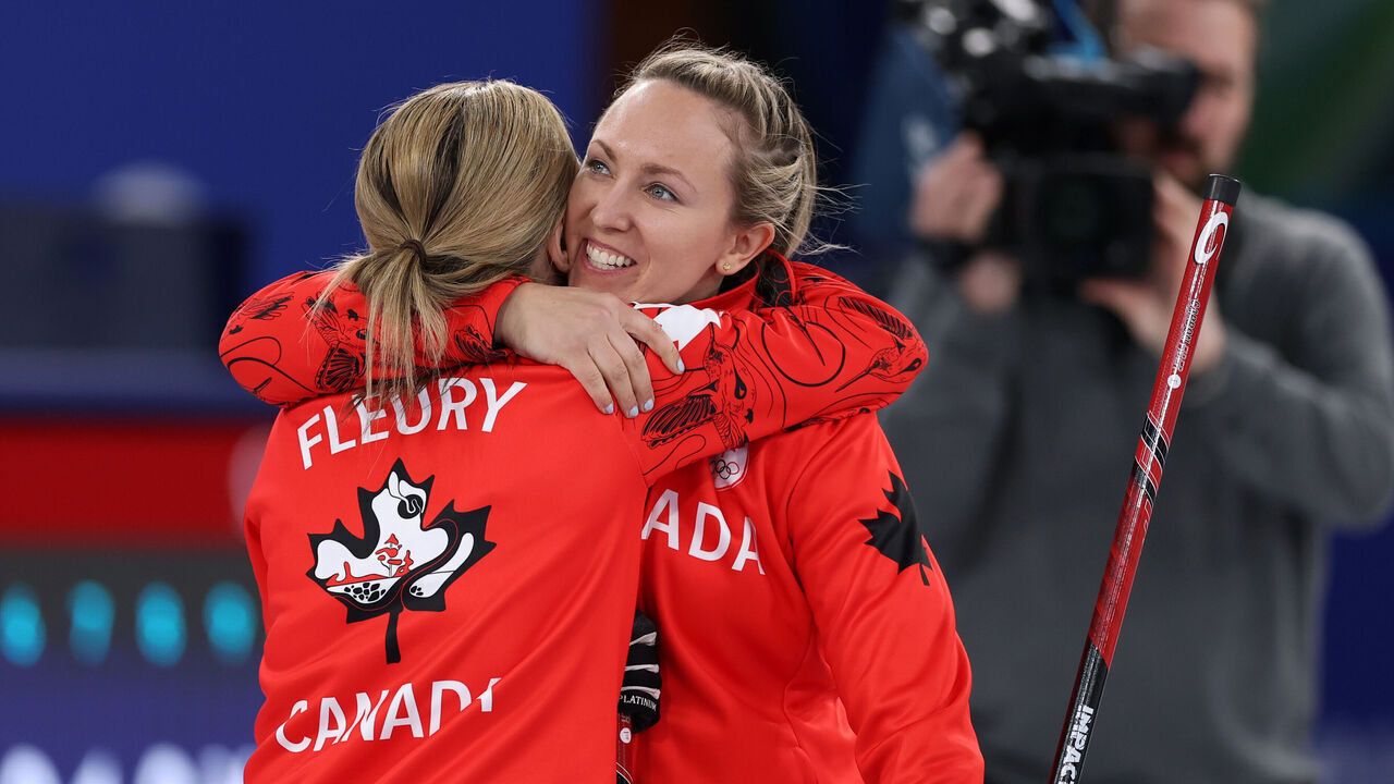 CORTINA D'AMPEZZO, ITALY - FEBRUARY 18: Rachel Homan of Team Canada celebrates victory with team mate Tracy Fleury following the Women's Round Robin match between Team Canada and Team Italy on day twelve of the Milano Cortina 2026 Winter Olympic games at Cortina Curling Olympic Stadium on February 18, 2026 in Cortina d'Ampezzo, Italy.
