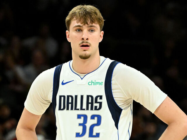 PHOENIX, ARIZONA - FEBRUARY 10: Cooper Flagg #32 of the Dallas Mavericks looks up court against the Phoenix Suns at Mortgage Matchup Center on February 10, 2026 in Phoenix, Arizona.