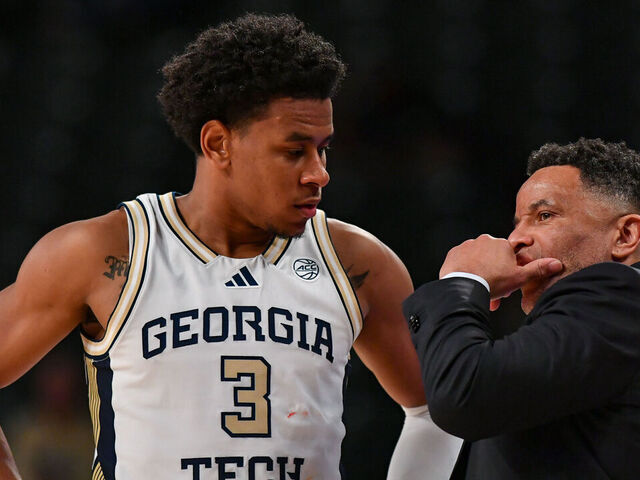 ATLANTA, GA - DECEMBER 03: Georgia Tech head coach Damon Stoudamire talks with guard Jaeden Mustaf (3) during the college basketball game between the Mississippi State Bulldogs and the Georgia Tech Yellow Jackets on December 3rd, 2025 at Hank McCamish Pavilion in Atlanta, GA.