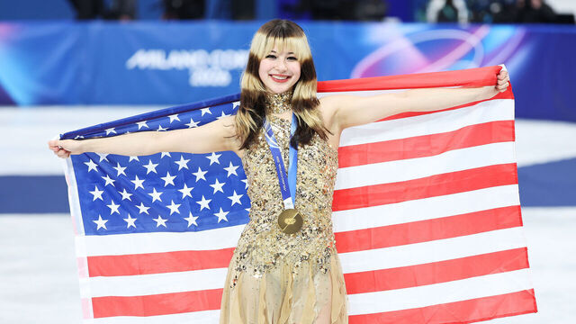 MILAN, ITALY - FEBRUARY 19: Gold medalist Alysa Liu of Team United States celebrates on the podium during the medal ceremony for the Women's Single Skating - Free Skating on day thirteen of the Milano Cortina 2026 Winter Olympics at Milano Ice Skating Arena on February 19, 2026 in Milan, Italy.
