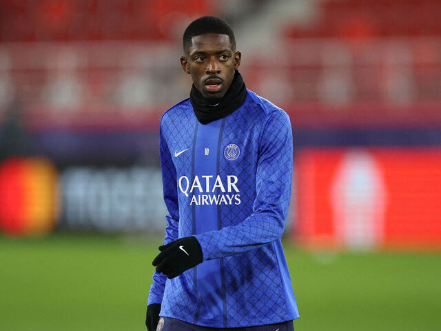 Paris Saint-Germain's French forward #10 Ousmane Dembele warms-up before the start of the UEFA Champions League knockout round play-off first leg football match between AS Monaco and Paris Saint-Germain at Stade Louis II in the Principality of Monaco on February 17, 2026.