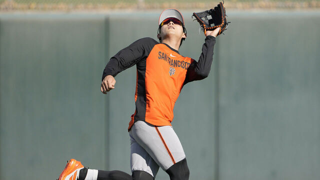 SCOTTSDALE, ARIZONA - FEBRUARY 15: Jung Hoo Lee #51 of the San Francisco Giants during outfield drills at Scottsdale Stadium on February 15, 2026 in Scottsdale, Arizona.