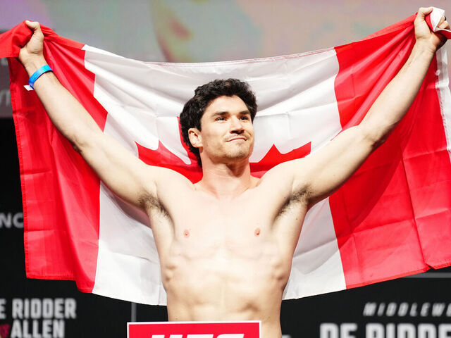 VANCOUVER, BRITISH COLUMBIA - OCTOBER 17: Mike Malott poses on the scale during the UFC Fight Night ceremonial weigh-ins at Rogers Arena on October 17, 2025 in Vancouver, British Columbia.