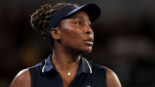 TOPSHOT - USA's Venus Williams reacts on a point to Serbia's Olga Danilovic during their women's singles match on day one of the Australian Open tennis tournament in Melbourne on January 18, 2026. / -- IMAGE RESTRICTED TO EDITORIAL USE - STRICTLY NO COMMERCIAL USE --