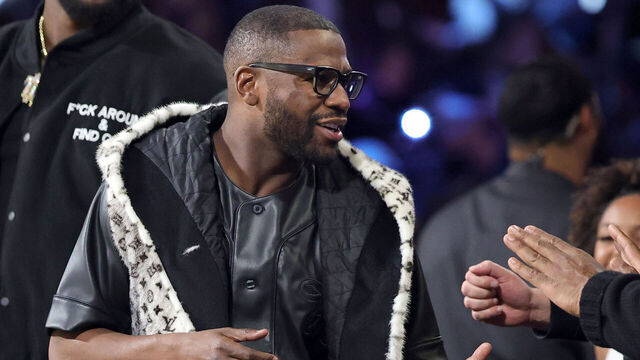 LAS VEGAS, NEVADA - DECEMBER 16: Floyd Mayweather Jr. greets people at halftime of the championship game of the Emirates NBA Cup between the San Antonio Spurs and the New York Knicks at T-Mobile Arena on December 16, 2025 in Las Vegas, Nevada. The Knicks defeated the Spurs 124-113.