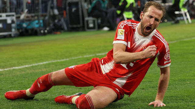 Bayern Munich's English forward #09 Harry Kane celebrates scoring the 3-0 goal during the German first division Bundesliga football match between FC Bayern Munich and Eintracht Frankfurt in Munich, southern Germany, on February 21, 2026. / DFL REGULATIONS PROHIBIT ANY USE OF PHOTOGRAPHS AS IMAGE SEQUENCES AND/OR QUASI-VIDEO