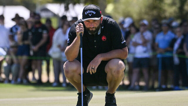 Legion XIII player Jon Rahm from Spain prepares to putt on the final day of the LIV Golf Adelaide tournament at The Grange Golf Club in Adelaide on February 15, 2026. / -- IMAGE RESTRICTED TO EDITORIAL USE - STRICTLY NO COMMERCIAL USE --