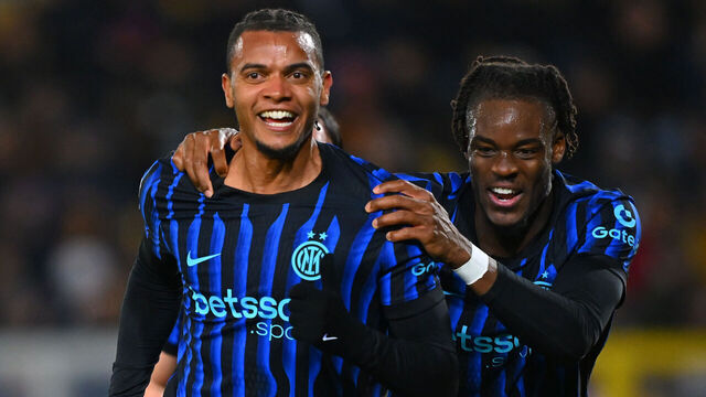 LECCE, ITALY - FEBRUARY 21: Manuel Akanji of FC Internazionale celebrates with Yann Bisseck after scoring the goal during the Serie A match between US Lecce and FC Internazionale at Stadio Via del Mare on February 21, 2026 in Lecce, Italy.