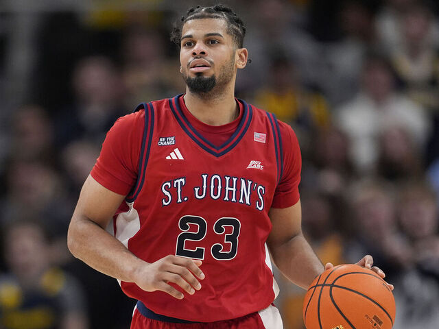 MILWAUKEE, WISCONSIN - FEBRUARY 18: Bryce Hopkins #23 of the St. John’s Red Storm dribbles the ball against the Marquette Golden Eagles during the second half at Fiserv Forum on February 18, 2026 in Milwaukee, Wisconsin.